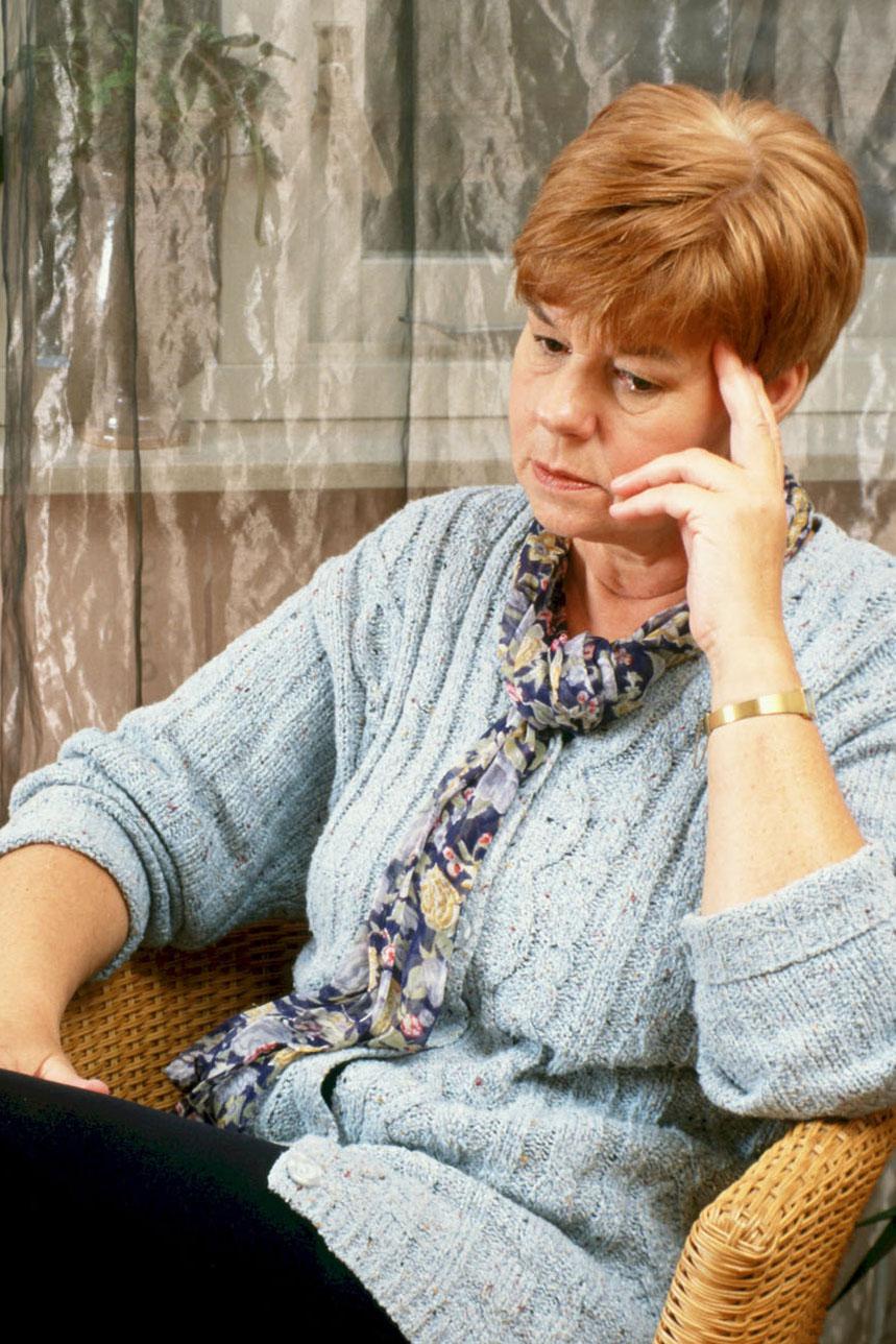 Picture of middle aged lady looking thoughtful